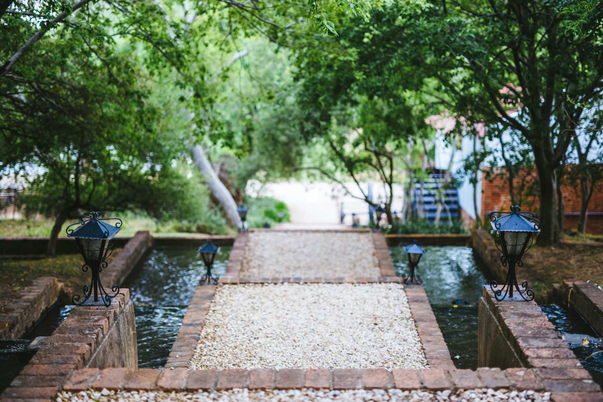 Beautiful garden pathway with water features.