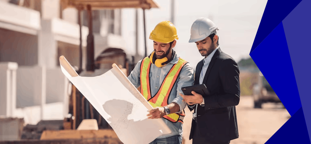 Engineer and worker reviewing blueprints on-site.